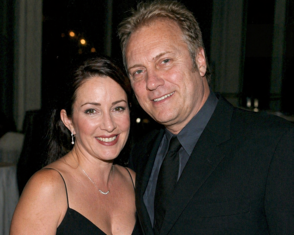 Constantine Yankoglu and Patricia Heaton posing together at a formal event